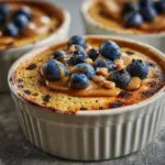 Baked Protein Pancake Bowls – The Simple, High-Protein Breakfast You’ll Crave 8 Baked protein pancake bowl topped with blueberries and cinnamon