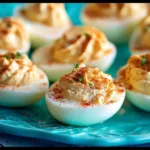 Close-up of Greek yogurt deviled eggs with paprika on top