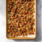 roasted protein trail mix cooling on a baking tray