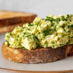 Scrambled eggs and avocado on toast high protein snack