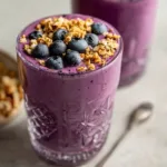 Blueberry Muffin Smoothie • Thick, Healthy & Muffin-like 7 Blueberry muffin smoothie in mason jar with oats, bananas, and fresh blueberries