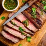 5-Ingredient Air Fryer Tri Tip – Juicy, Simple & Protein-Packed! 8 Air fryer tri tip steak with chimichurri and knife on board