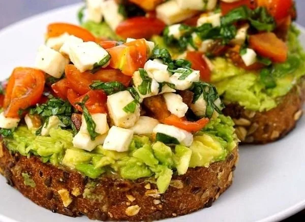 Avocado Toast with Tomatoes, Basil, and Mozzarella