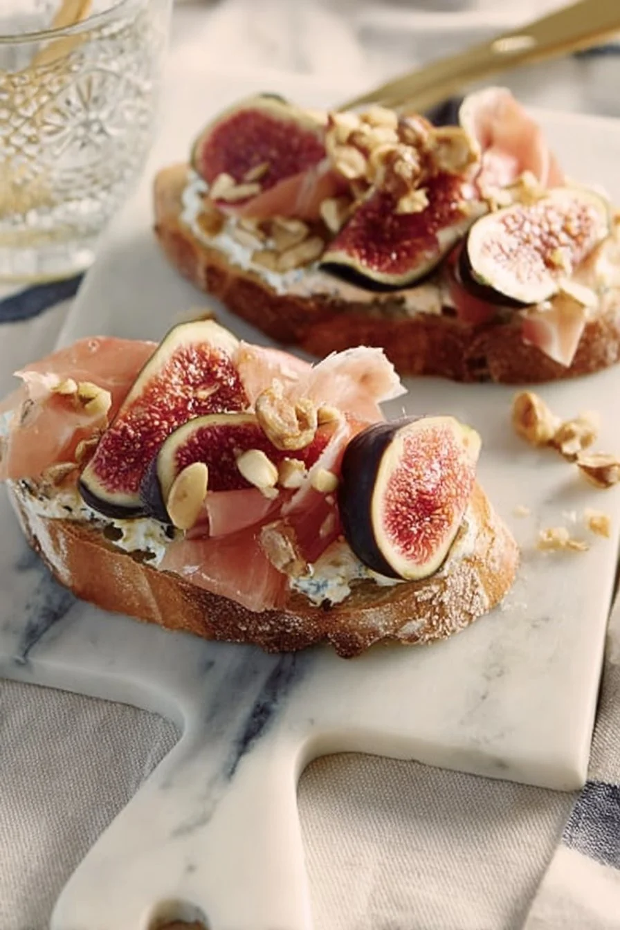 Delicious Fig and Parma Ham Toast topped with fresh figs and crispy parma ham.
