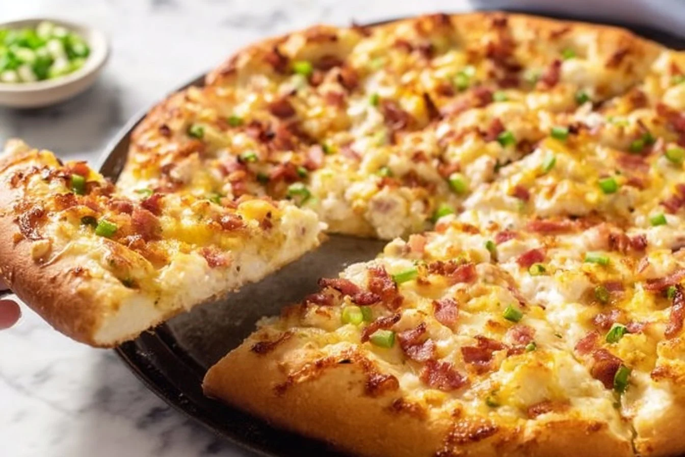 Breakfast Pizza 4 Delicious homemade breakfast pizza topped with eggs, cheese, and vegetables
