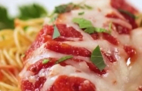 Delicious Chicken Parmesan with crispy chicken, marinara sauce, and melted cheese