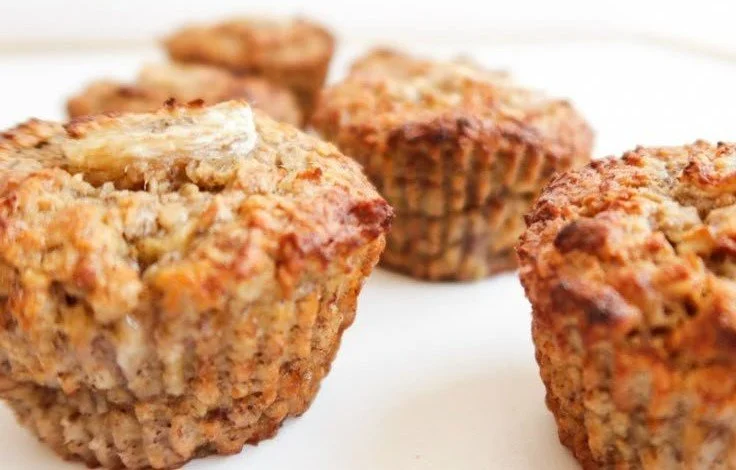 Healthy banana oatmeal muffins with oats and ripe bananas for a nutritious snack.