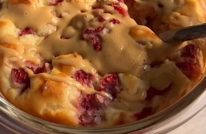 Fluffy baked protein pancake bowl served with fresh berries and syrup